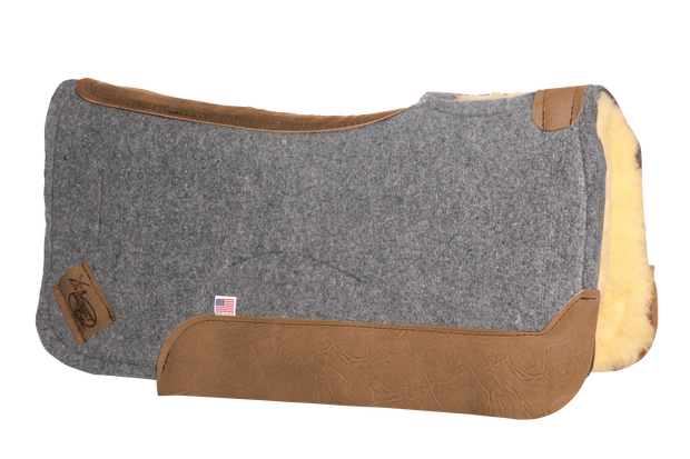 Contour saddle pad in gray felt with brown leather and fleece underside