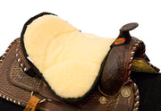 Saddle Seat Cushion with cream fleece placed on a saddle